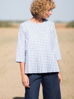 Checkered cotton blouse with a pleated peplum