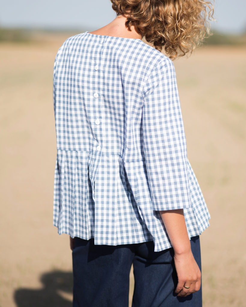 Checkered cotton blouse with a pleated peplum - Image 3