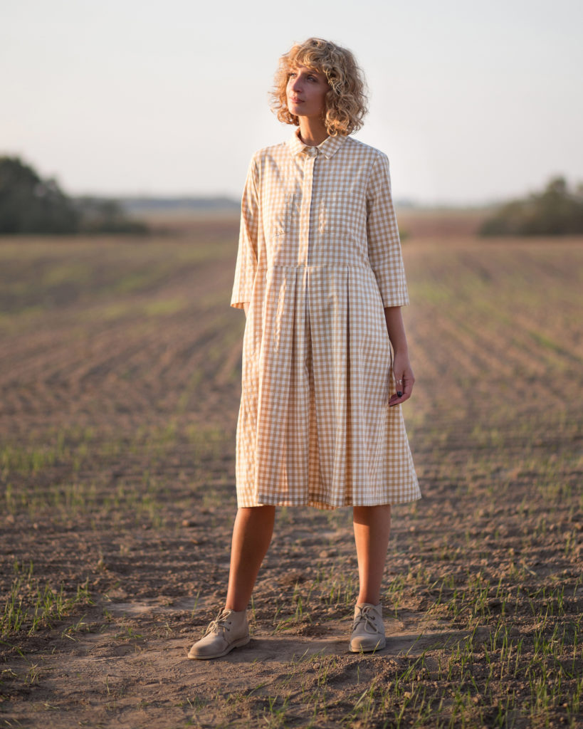 Checkered shirt dress with a pleated skirt - Image 1