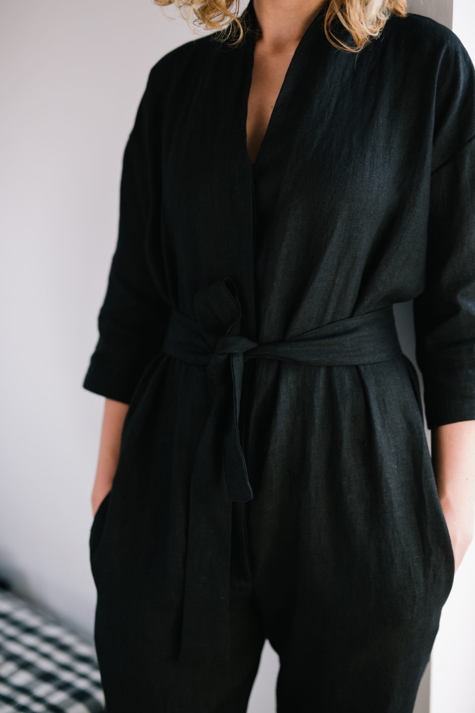 V-neck jumpsuit in black linen - Image 1