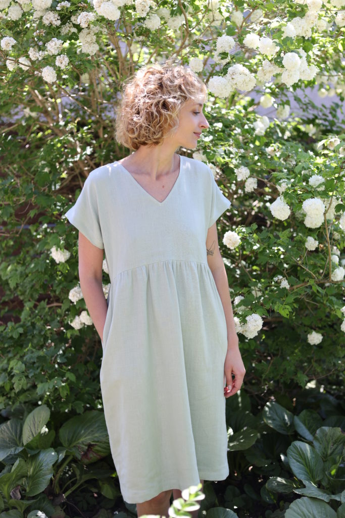 V-neck linen dress in sage green color - Image 3