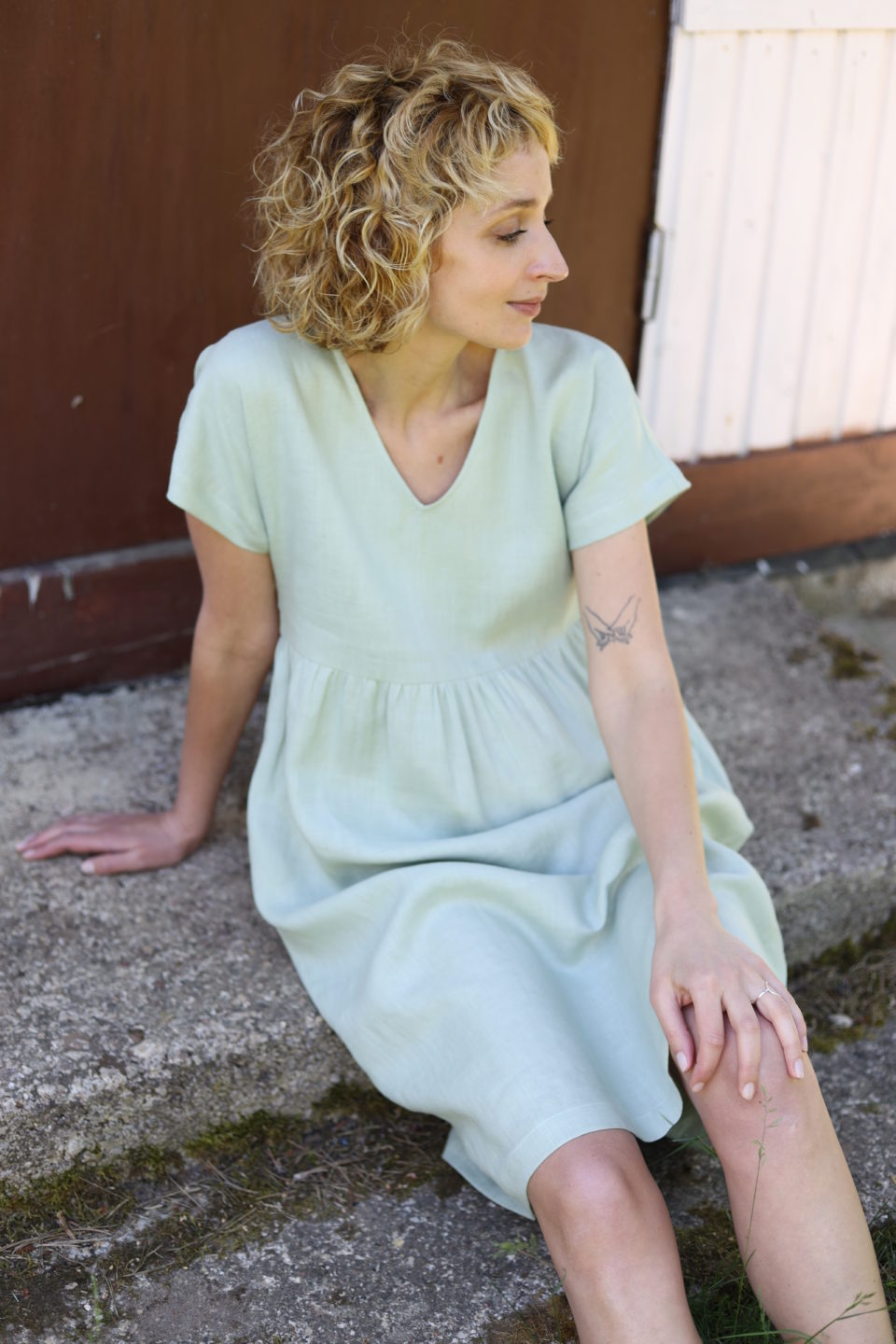 V-neck linen dress in sage green color - Image 4