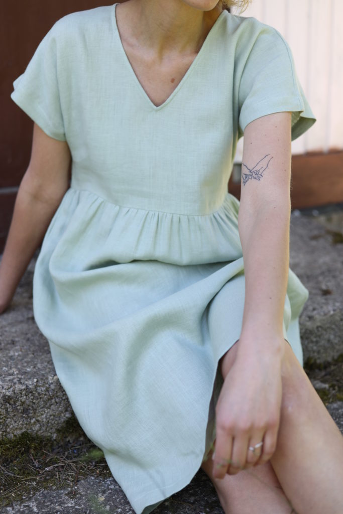 V-neck linen dress in sage green color - Image 5