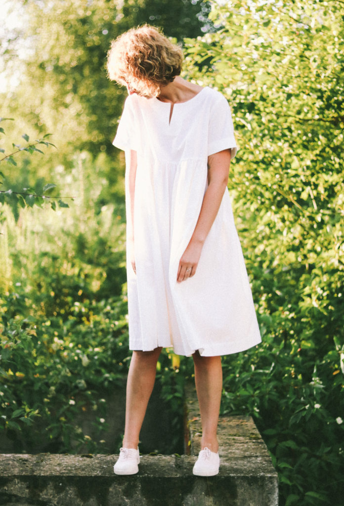 White cotton sundress with short folded sleeves
