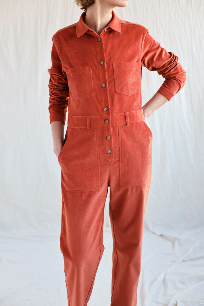 Needlecord long sleeve boiler suit in brick orange - Image 1