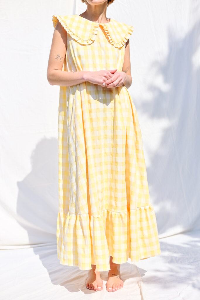 Collared sleeveless summer dress in yellow seersucker checks - Image 1