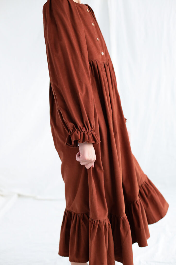 Needlecord long sleeve dress in brick color - Image 2